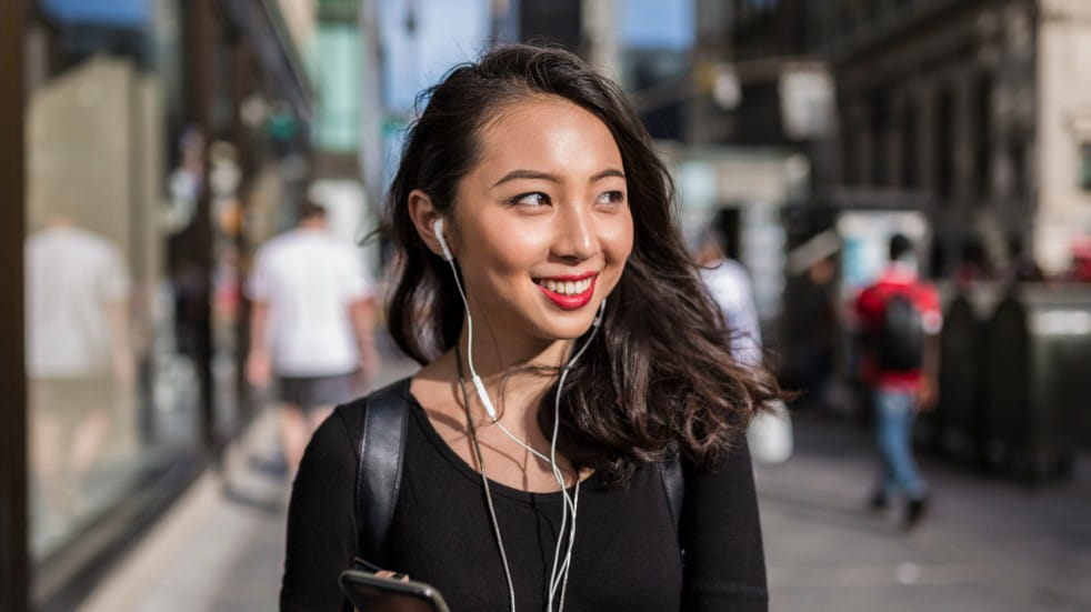 Woman smiling headphones